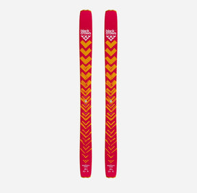 Top view of a pair of orange Black Crows Nocta skis