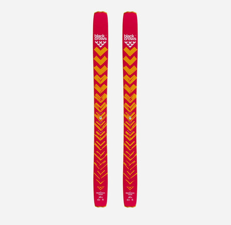 Top view of a pair of orange Black Crows Nocta skis