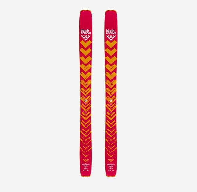Top view of a pair of orange Black Crows Nocta skis
