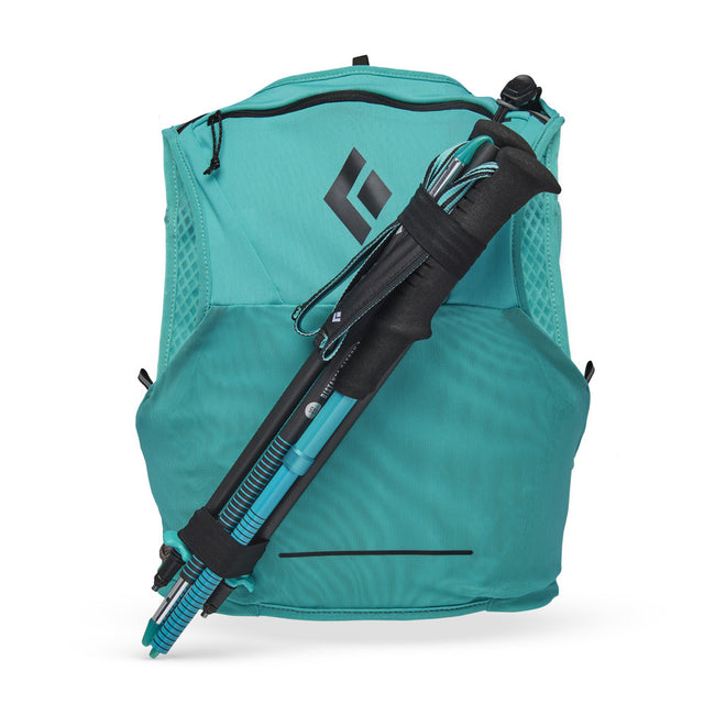 Poles packed on the Black Diamond Distance 4 women's hydration vest in Dark Patina colour