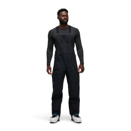Front on-model view of men's black Black Diamond Recon Stretch bibs