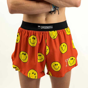 Front on-model view of men's Chicknlegs 4" half split running shorts in smileys print