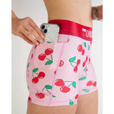 Side pocket detail of women's cherry print Chicknlegs compression shorts