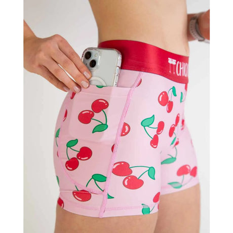 Side pocket detail of women's cherry print Chicknlegs compression shorts