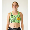 Front view of ChicknLegs OG sports bra in pickles print