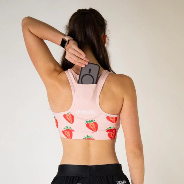 Back view of ChicknLegs OG sports bra in strawberry print