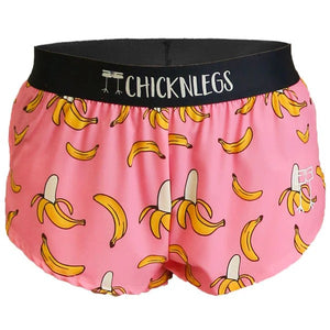 Women's ChicknLegs 1.5" split running shorts in pink bananas print
