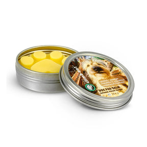 Dog pad balm in a metal tin with lid off