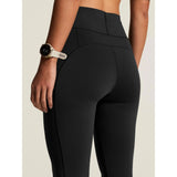 Back on-model closeup view of women's black Craft Hypervent running tights