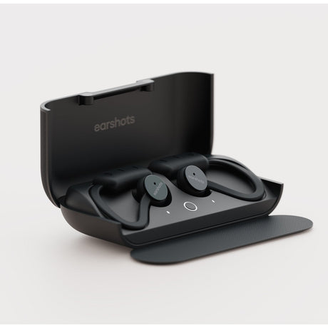 Pair of black Earshots sports earbuds in charging case