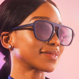 Model wearing goodr Retro G sunglasses