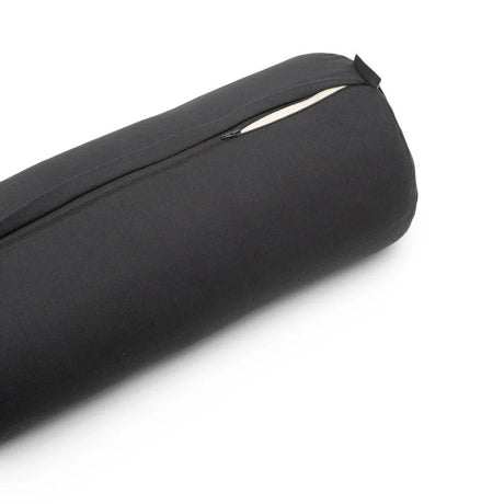 Black cylindrical yoga bolster zipper detail