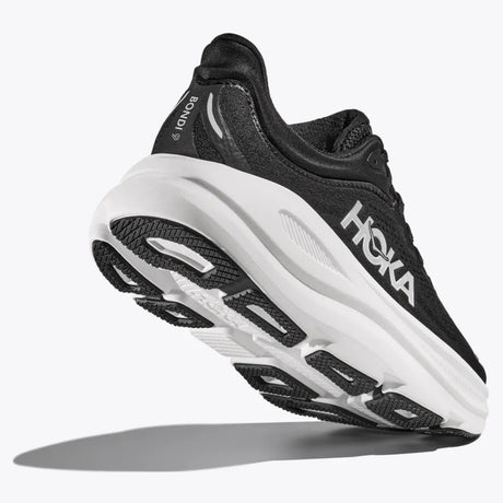 Sole view of Hoka Bondi 9 running shoe in black/white