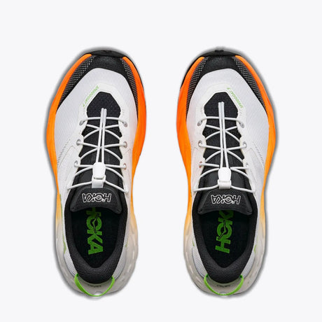 Top view of kids' white/orange Hoka Speedgoat 7 running shoes
