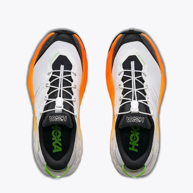 Top view of kids' white/orange Hoka Speedgoat 7 running shoes