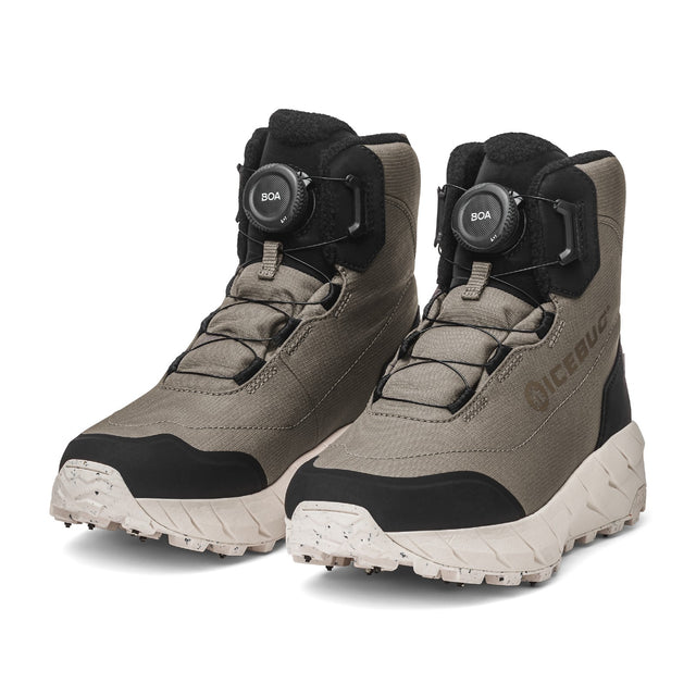 Pair of taupe/black Icebug Alne studded winter boots