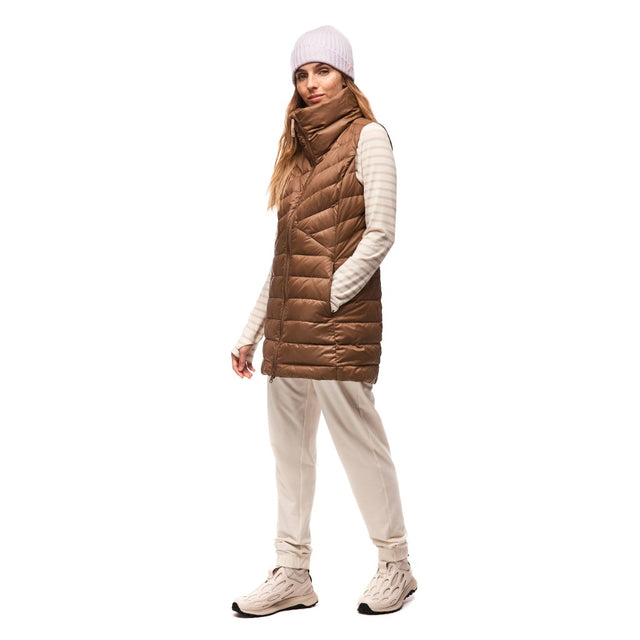 Side on-model view of women's bronze Indyeva Kapa insulated vest