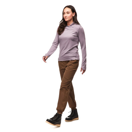Side view of woman wearing purple Indyeva Strike III long sleeve shirt