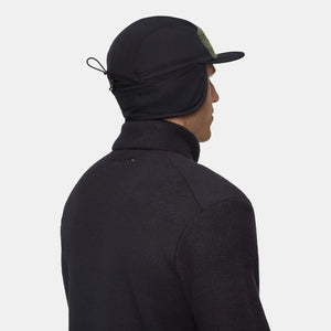 Back on-model view of black and green Mammut sports fleece cap