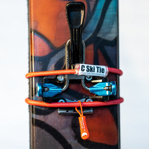 Mountain Sense C Ski tie wrapped around skis