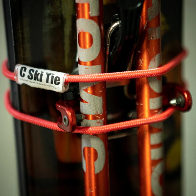 Mountain Sense C Ski Tie wrapped around skis and poles