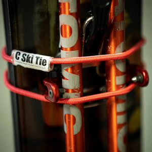 Mountain Sense C Ski Tie wrapped around skis and poles