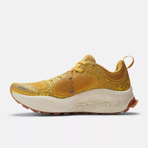 Inner side view of women's New Balance Fresh Foam X Hierro v8 running shoe in ginger/lemon colour