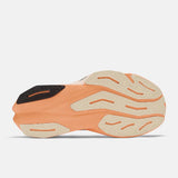 Sole of men's New Balance FuelCell Rebel v4 running shoe in mango/angora/black colour