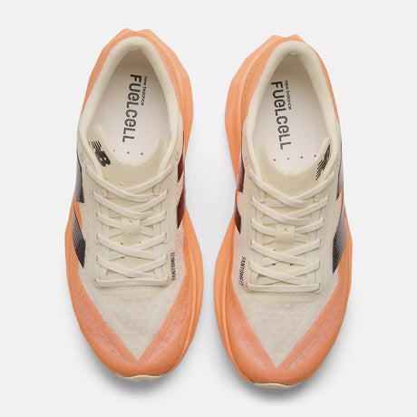 Top view of men's New Balance FuelCell Rebel v4 running shoe in mango/angora/black colour