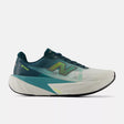 Side view of men's 'medusa green' (teal) New Balance FuelCell Rebel v5 running shoe