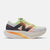 Side view of men's New Balance FuelCell SuperComp Elite v4 running shoe in white/lime glo colour