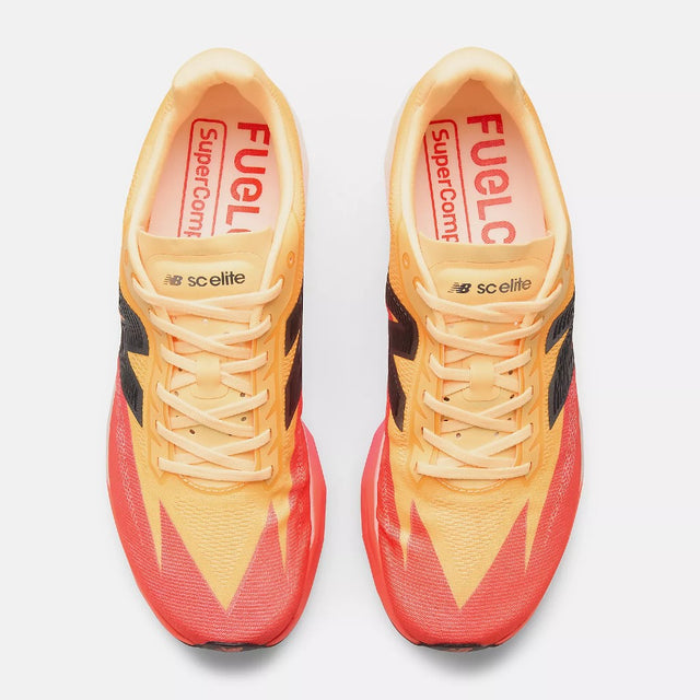Top view of men's tangerine New Balance FuelCell SuperComp Elite v5 running shoes