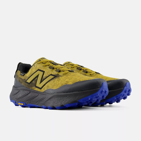 Pair of men's gold/black New Balance Hierro v9 Gore-Tex trail running shoes