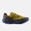 Side view of men's gold/black New Balance Hierro v9 Gore-Tex trail running shoe