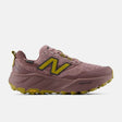 Side view of women's pink/gold New Balance Hierro v9 Gore-Tex trail running shoe