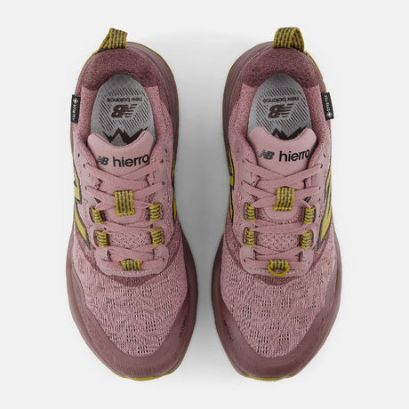 Top view of women's pink/gold New Balance Hierro v9 Gore-Tex trail running shoes