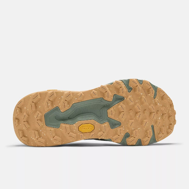 Sole of men's New Balance Hierro v9 trail running shoe in dark juniper/apricot colour