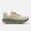 Side view of women's New Balance hierro v9 trail running shoe in calcium/juniper colour
