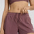 Front detail of women's licorice New Balance RC Shorts