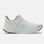 Side view of women's New Balance Fresh Foam X running shoe in White Blue