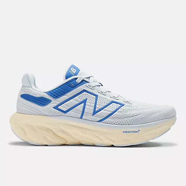 Side view of women's New Balance Fresh Foam X 1080v13 running shoe in starlight with marine blue