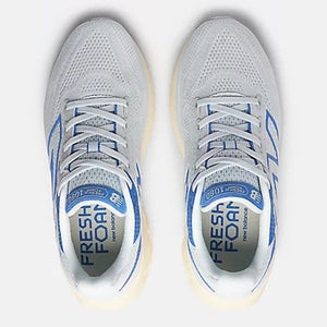 Top view of women's New Balance Fresh Foam X 1080v13 running shoes in starlight with marine blue