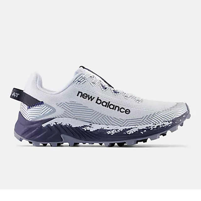 Side view of women's New Balance Summit Unknown v4 running shoe in blue