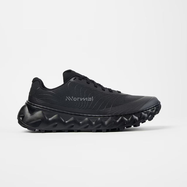 Side view of NNormal Tomir 2.0 trail running shoe in black