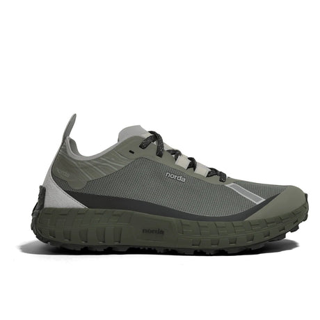 Side view of green ('serpentine') norda 001a trail running shoe
