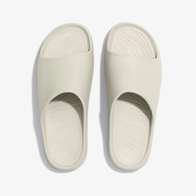 Top view of norda 008 recovery slides in 'Neve' (white) colour
