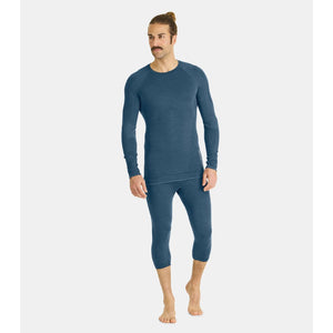 On-model view of men's Ortovox 230 competition zip neck long sleeve in blue