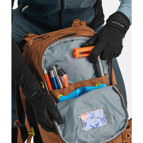 Safety compartment detail of ortovox haute route 32 ski touring pack
