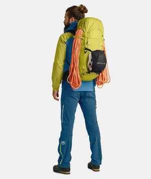 Ortovox peak light 32 backpack on model packed with gear