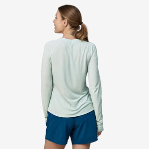 Back of women's patagonia capilene cool long-sleeved trail shirt in wispy green